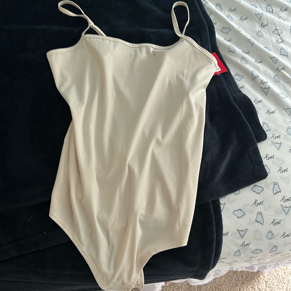 Never worn. new with tags. Spanx cream